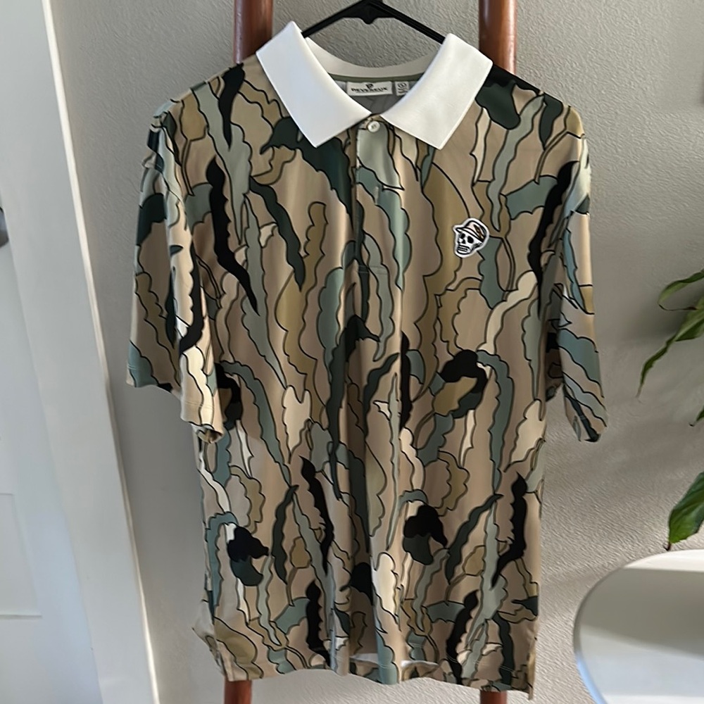 Green and White Polo Shirt with Abstract Pattern